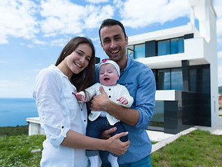 Image showing happy young family at home