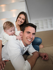 Image showing happy young family at home