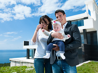 Image showing happy young family at home