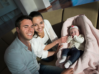 Image showing happy young family at home