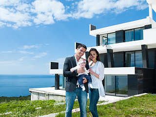 Image showing happy young family at home