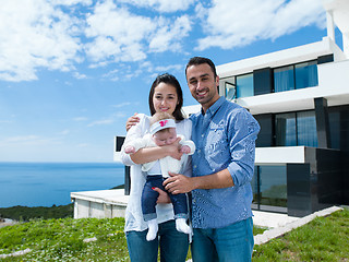 Image showing happy young family at home