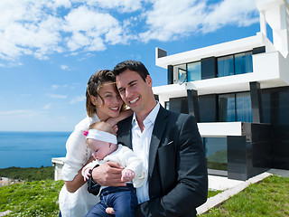 Image showing happy young family at home