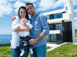 Image showing happy young family at home