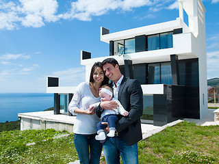 Image showing happy young family at home