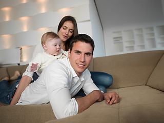 Image showing happy young family at home