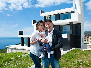 Image showing happy young family at home