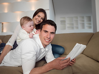 Image showing happy young family at home