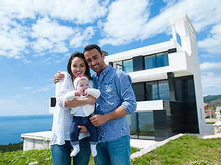 Image showing happy young family at home