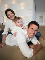 Image showing happy young family at home