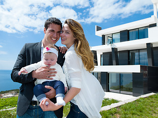 Image showing happy young family at home