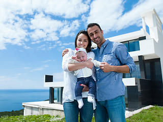 Image showing happy young family at home