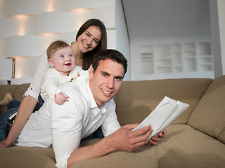 Image showing happy young family at home