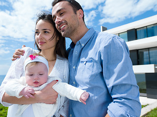 Image showing happy young family at home