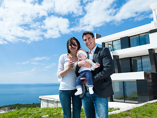 Image showing happy young family at home