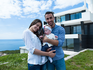 Image showing happy young family at home