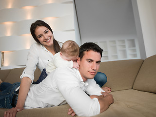 Image showing happy young family at home