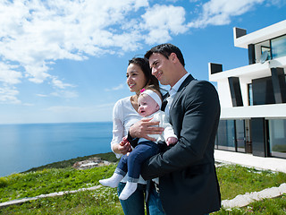 Image showing happy young family at home