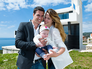 Image showing happy young family at home