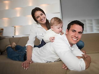 Image showing happy young family at home