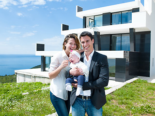 Image showing happy young family at home