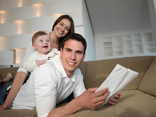 Image showing happy young family at home