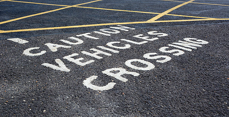 Image showing Caution vehicles crossing - warning in car park