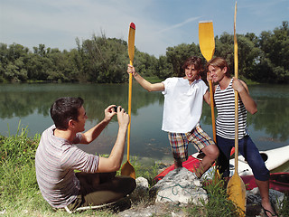 Image showing friends having fun at sunday near river