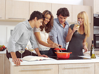 Image showing Friends Preparing Breakfast l