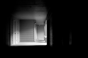 Image showing dark corridor leading to outside light