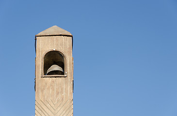 Image showing wooden belfry toy model on blue sky background 