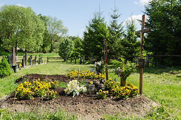 Image showing freshly made grave soil and foundation in cemetery 