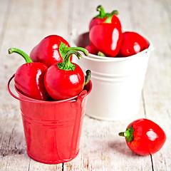 Image showing red hot chilli peppers in little buckets