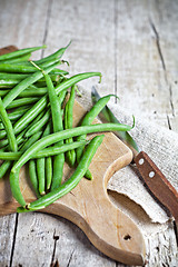 Image showing green string beans and knife 