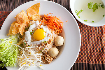 Image showing Thai Noodle Dish with Fried Egg