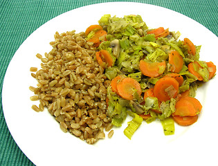 Image showing Dish made of cooked bulgur wheat groats, carrots and leek