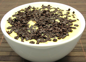 Image showing Custard with grated chocolate in a bowl of china ware