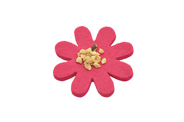 Image showing Minced hazelnuts and felt decoration