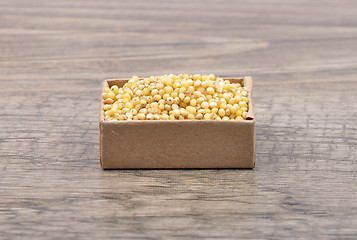 Image showing Sorghum on wood