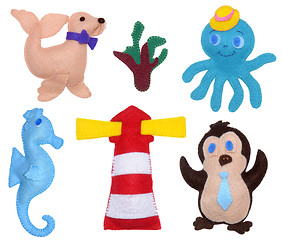 Image showing Penguin, octopus, seahorse, sea calf and lighthouse 