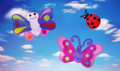 Image showing Ladybug and butterflies