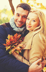 Image showing romantic couple in the autumn park