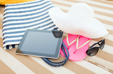 Image showing close up of tablet pc on beach