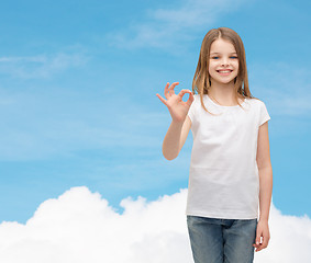 Image showing little girl in white t-shirt showing ok gesture