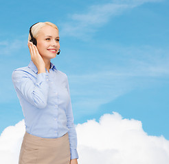 Image showing friendly female helpline operator