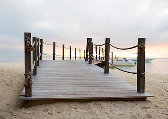 Image showing close up of pier on tropical beach