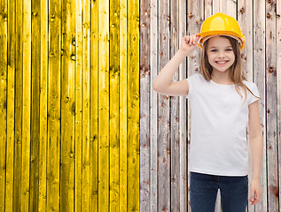 Image showing smiling little girl in protective helmet