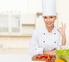 Image showing female chef with vegetables showing ok sign