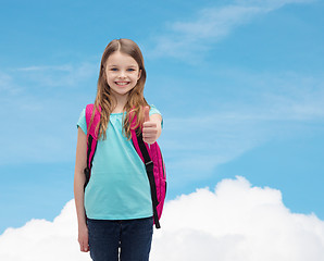 Image showing smiling girl with school bag showing thumbs up