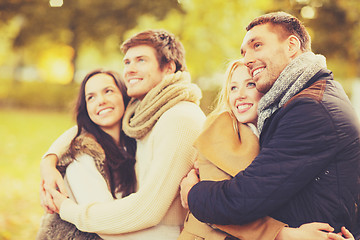 Image showing group of friends having fun in autumn park